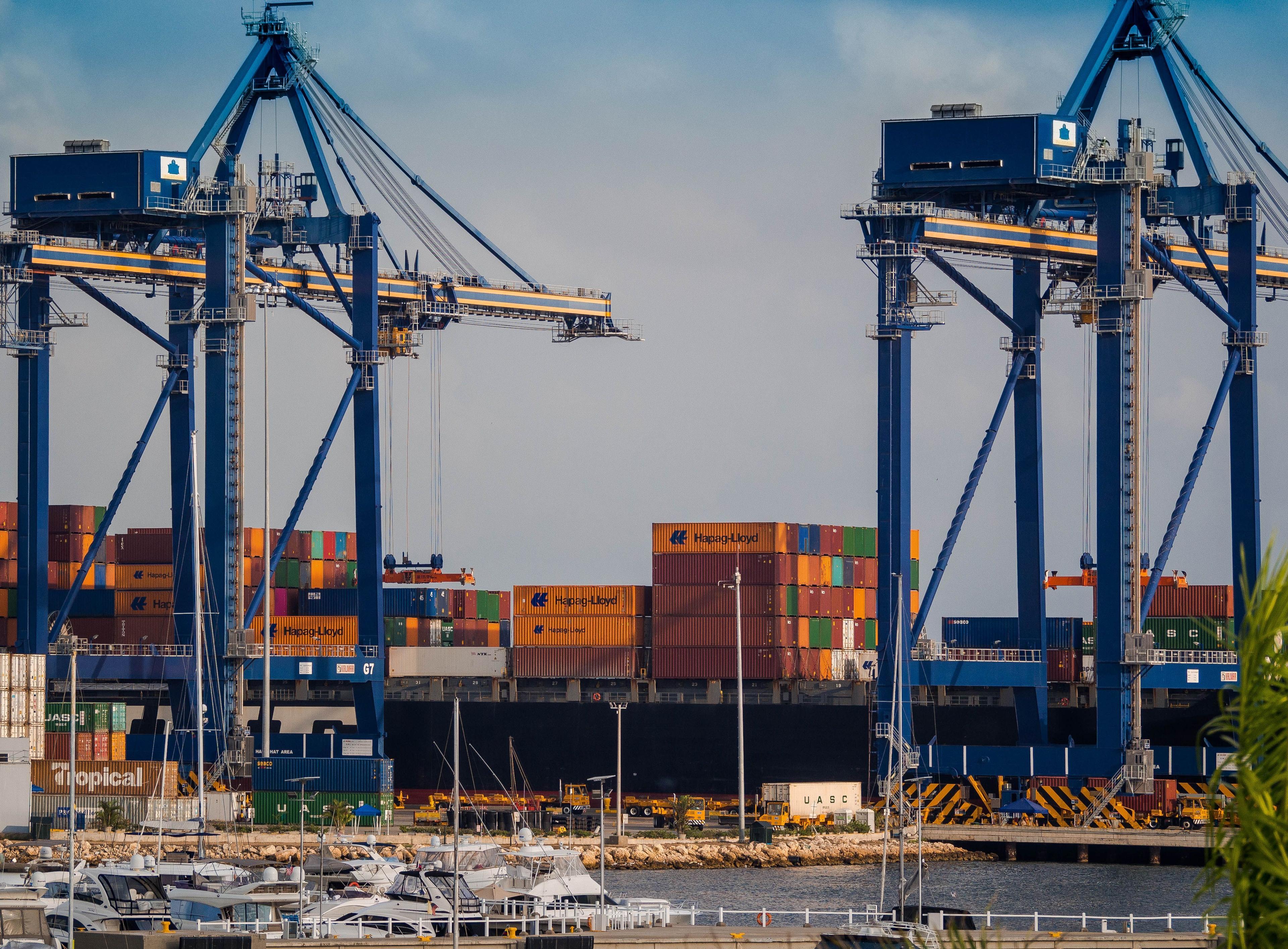 Shipping port with cranes and containers representing African trade and export opportunities